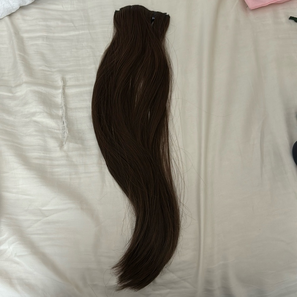 Synthetic hair extensions. Brown/ Auburn